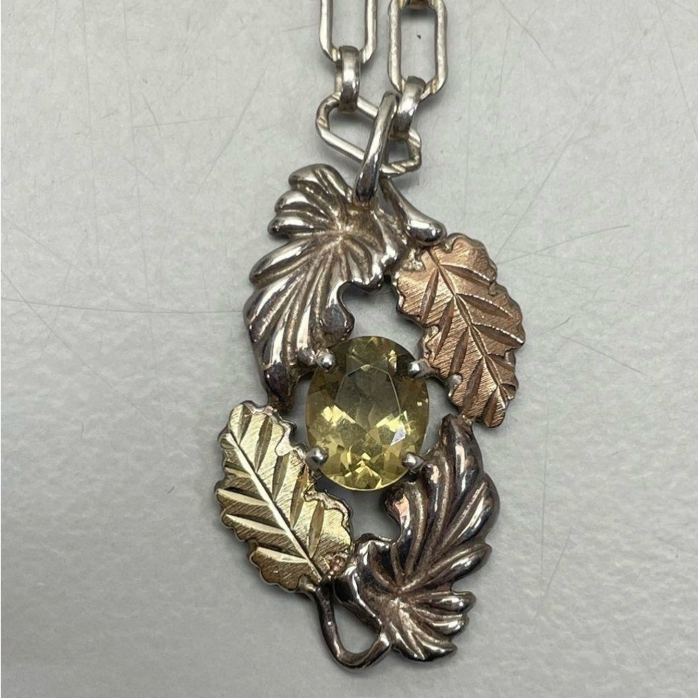 Elegant Silver and Gold Leaf Pendant Necklace